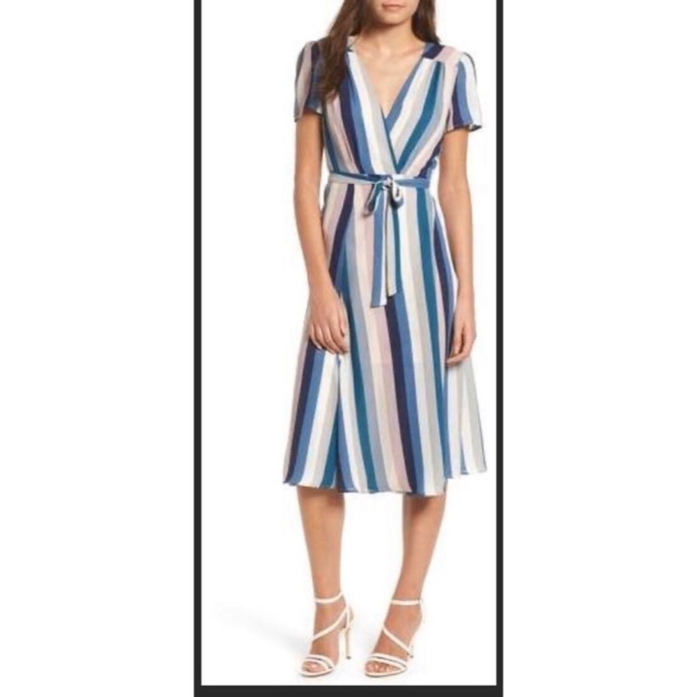 New without tag. Beautiful wrap dress. Size Xl